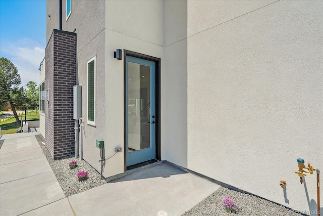 1372 Lowell Blvd Unit 1, Denver, CO 80204 - property entrance with stucco siding