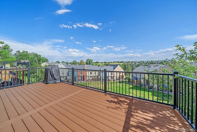 9346 W Coal Mine Ave, Littleton, CO 80123 - wooden terrace featuring a yard and a residential view
