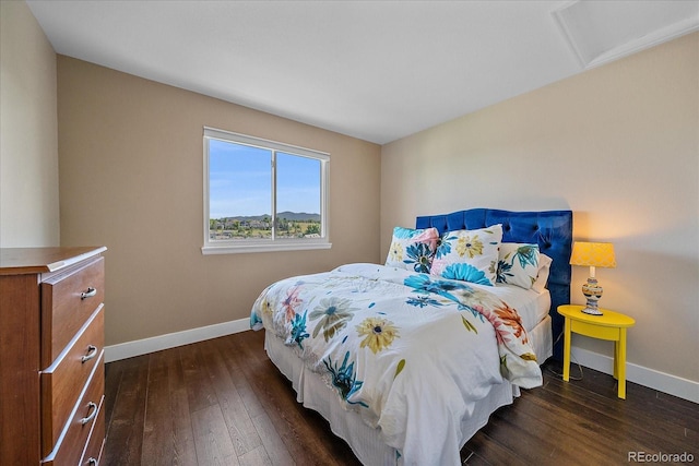 9346 W Coal Mine Ave, Littleton, CO 80123 - bedroom featuring dark wood-type flooring and attic access