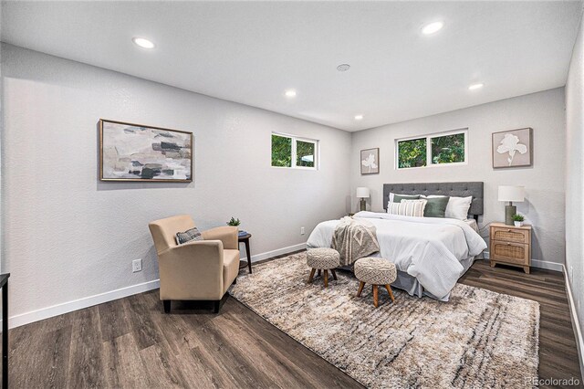 6032 Estes St, Arvada, CO 80004 - bedroom featuring dark wood-type flooring and recessed lighting