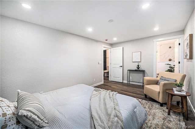 6032 Estes St, Arvada, CO 80004 - bedroom with wood finished floors and recessed lighting