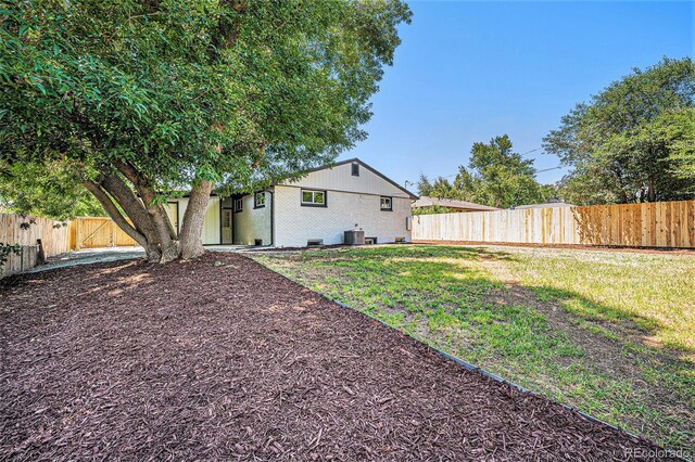 6032 Estes St, Arvada, CO 80004 - rear view of property featuring a fenced backyard
