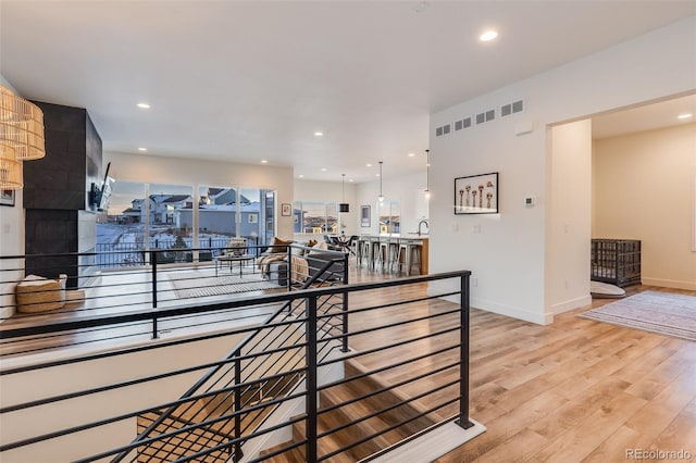 hallway featuring light hardwood / wood-style floors