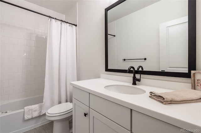 full bathroom with toilet, shower / tub combo, and vanity