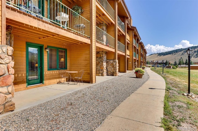 exterior space featuring a mountain view