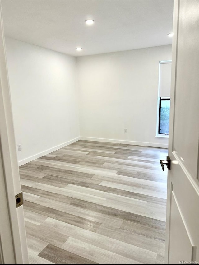 6480 S Dayton St Unit M04, Englewood, CO 80111 - unfurnished room featuring recessed lighting and light wood-style floors