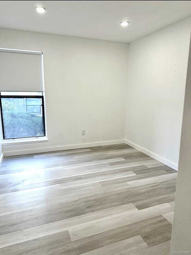 6480 S Dayton St Unit M04, Englewood, CO 80111 - unfurnished room with wood finished floors and recessed lighting