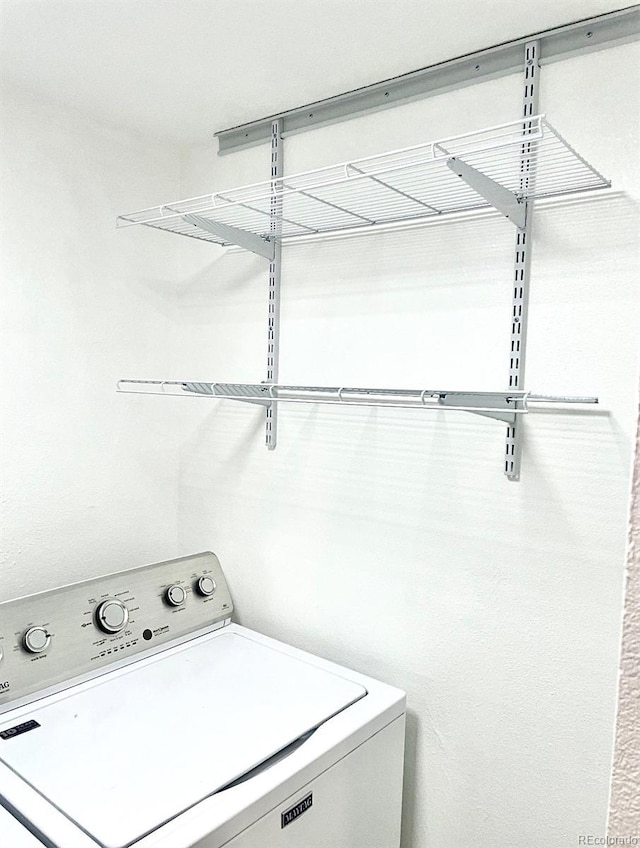 6480 S Dayton St Unit M04, Englewood, CO 80111 - washroom featuring washer / clothes dryer