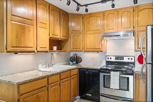 9320 E Center Ave Unit 4B, Denver, CO 80247 - kitchen featuring under cabinet range hood, stainless steel appliances, a sink, and decorative backsplash