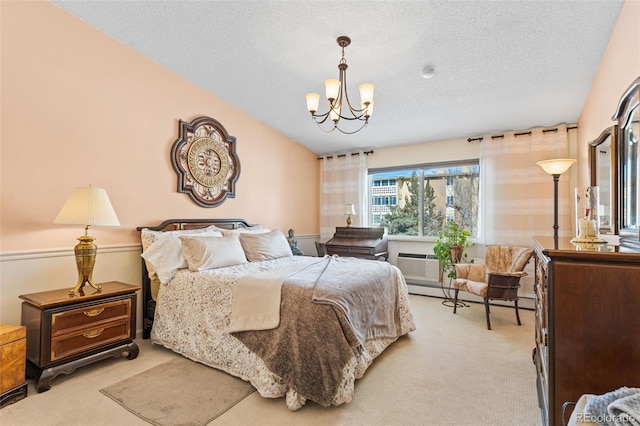 9320 E Center Ave Unit 4B, Denver, CO 80247 - bedroom with light colored carpet, a chandelier, a textured ceiling, and a wall mounted AC