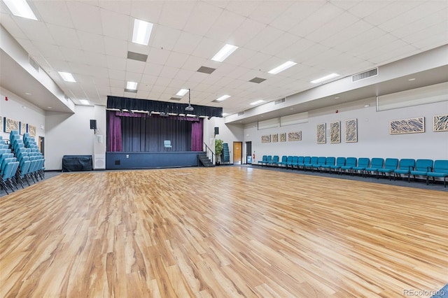 9320 E Center Ave Unit 4B, Denver, CO 80247 - miscellaneous room with wood finished floors and a drop ceiling