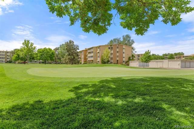 9320 E Center Ave Unit 4B, Denver, CO 80247 - view of home's community featuring a lawn and view of golf course