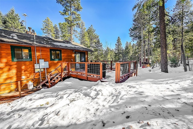 view of snow covered deck