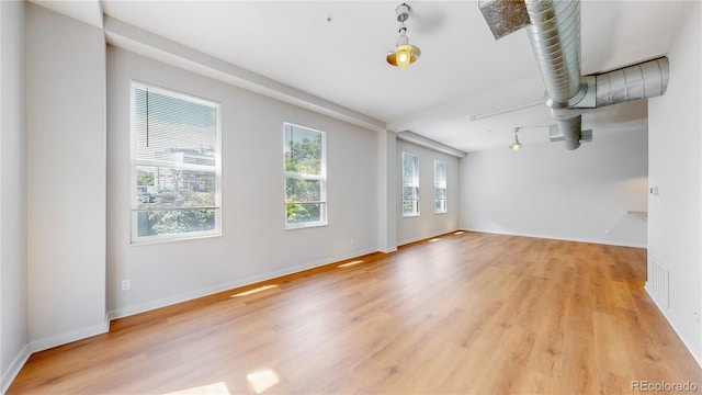 1521 Central St Unit 2D, Denver, CO 80211 - unfurnished room with light wood finished floors