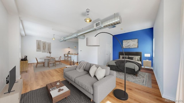 1521 Central St Unit 2D, Denver, CO 80211 - living room featuring wood finished floors
