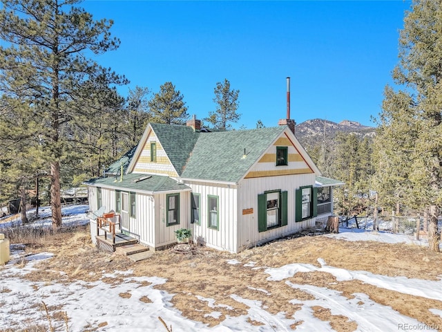 view of front of house with a mountain view