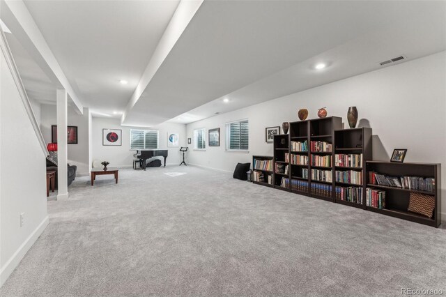 living area featuring recessed lighting, baseboards, visible vents, and carpet flooring