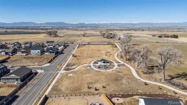 birds eye view of property featuring a residential view and a mountain view