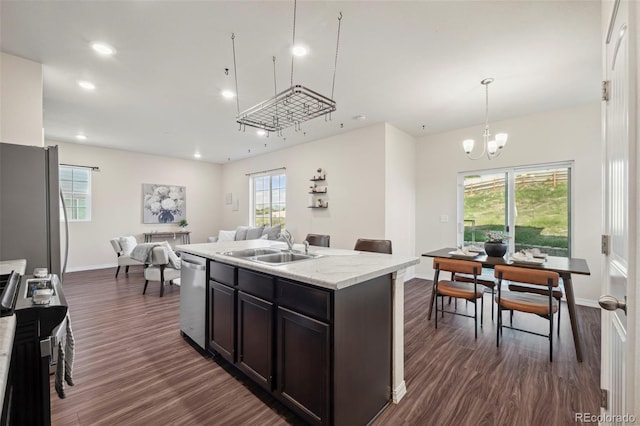 4644 High Springs Ct, Colorado Springs, CO 80917 - kitchen featuring appliances with stainless steel finishes, dark wood-style floors, open floor plan, healthy amount of natural light, and recessed lighting