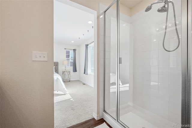 4644 High Springs Ct, Colorado Springs, CO 80917 - bathroom featuring a stall shower and wood finished floors