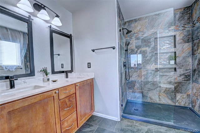 bathroom featuring vanity and a shower with shower door