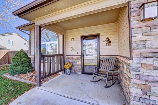 entrance to property with a patio area