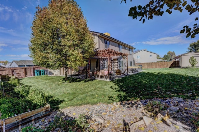 back of property with a storage shed, a patio, a lawn, and a pergola