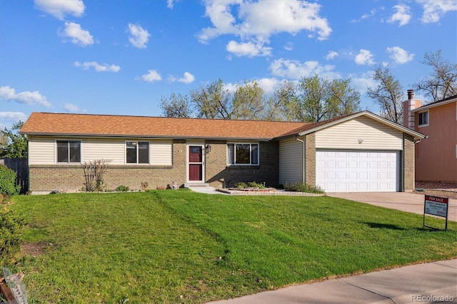 16246 E Hamilton Pl, Aurora, CO 80013 - ranch-style house with brick siding, entry steps, a garage, driveway, and a front yard