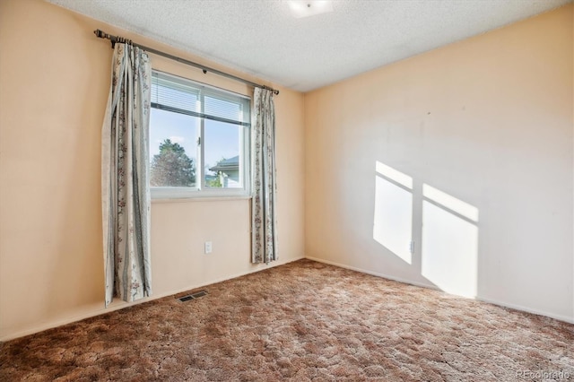 16246 E Hamilton Pl, Aurora, CO 80013 - carpeted empty room featuring a textured ceiling and baseboards