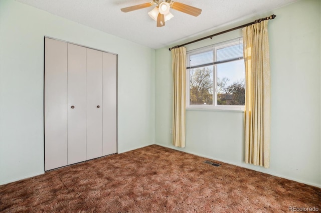 16246 E Hamilton Pl, Aurora, CO 80013 - unfurnished bedroom featuring carpet flooring, a closet, and a ceiling fan