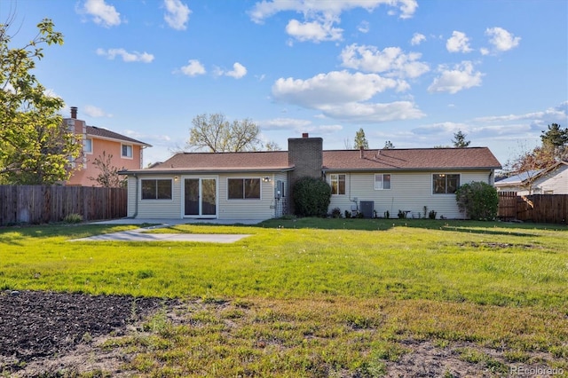16246 E Hamilton Pl, Aurora, CO 80013 - rear view of property with a chimney