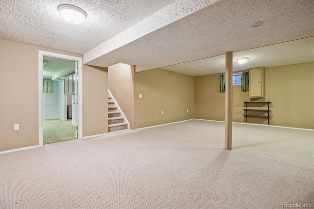 16246 E Hamilton Pl, Aurora, CO 80013 - finished basement featuring stairway, carpet flooring, a textured ceiling, and baseboards