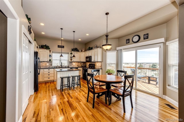 34942 Wagon Wheel Trl, Elizabeth, CO 80107 - dining space with healthy amount of natural light, light wood-type flooring, and recessed lighting