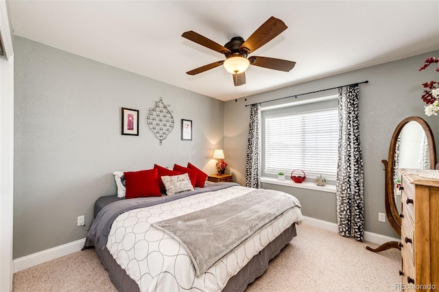 34942 Wagon Wheel Trl, Elizabeth, CO 80107 - bedroom with light carpet, baseboards, and a ceiling fan
