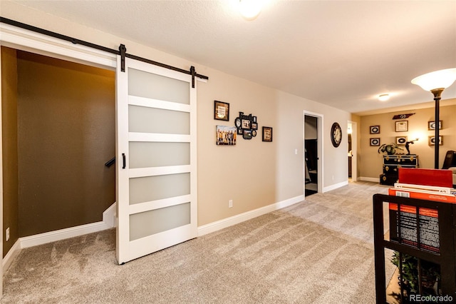 34942 Wagon Wheel Trl, Elizabeth, CO 80107 - interior space with carpet flooring, a barn door, and baseboards