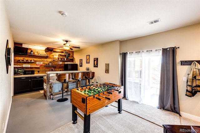 34942 Wagon Wheel Trl, Elizabeth, CO 80107 - rec room with bar with sink, a ceiling fan, and baseboards