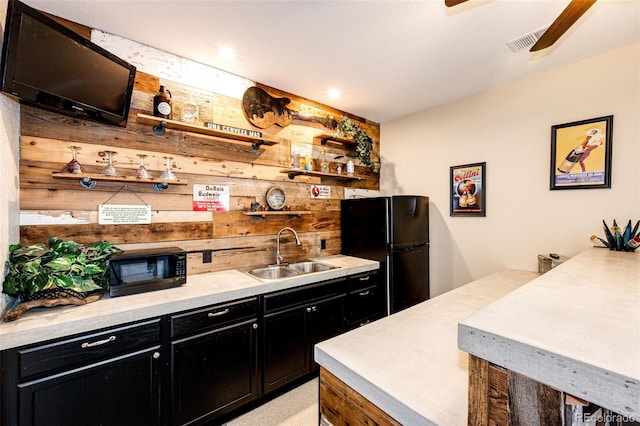 34942 Wagon Wheel Trl, Elizabeth, CO 80107 - indoor bar with black appliances, wood walls, ceiling fan, and recessed lighting