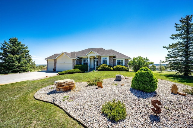 34942 Wagon Wheel Trl, Elizabeth, CO 80107 - single story home featuring a front yard, stone siding, concrete driveway, and an attached garage