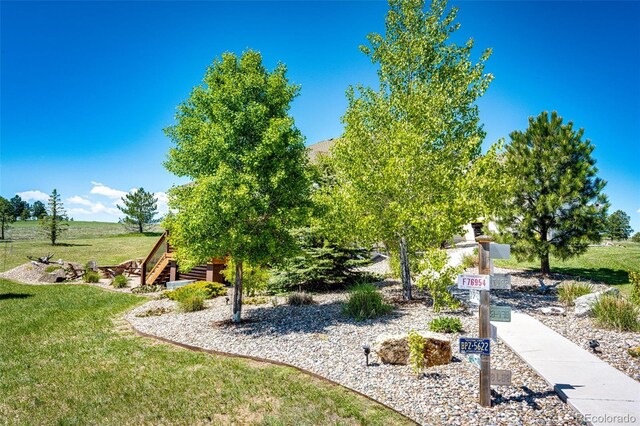 34942 Wagon Wheel Trl, Elizabeth, CO 80107 - view of community with a lawn