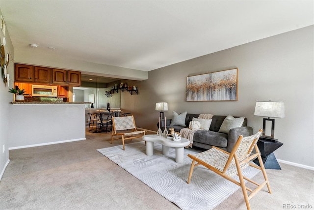 9283 E Arbor Cir Unit C, Englewood, CO 80111 - living area featuring light colored carpet and baseboards