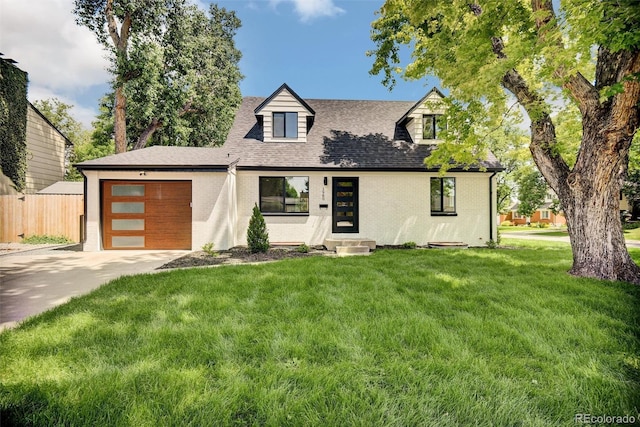 1980 S Kearney Way, Denver, CO 80224 - view of front of house with driveway, an attached garage, brick siding, and roof with shingles