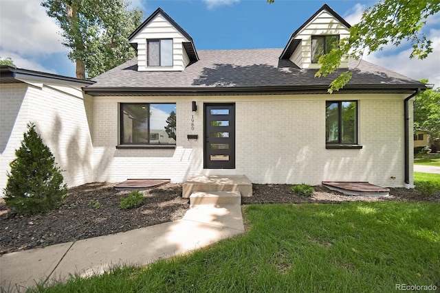 1980 S Kearney Way, Denver, CO 80224 - view of front of property with brick siding and roof with shingles