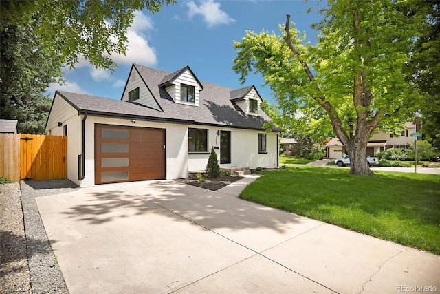 1980 S Kearney Way, Denver, CO 80224 - view of front of house featuring an attached garage, concrete driveway, and a shingled roof