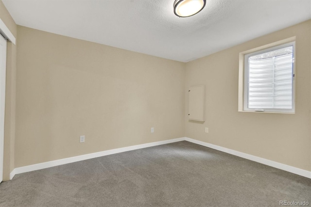1980 S Kearney Way, Denver, CO 80224 - carpeted empty room with baseboards