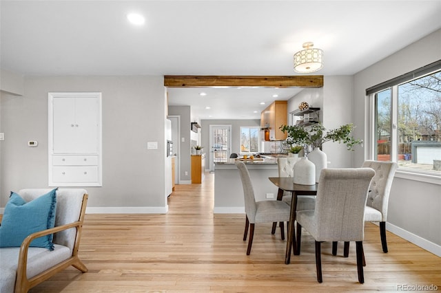 1295 Elm St, Denver, CO 80220 - dining room featuring light wood finished floors, healthy amount of natural light, and recessed lighting