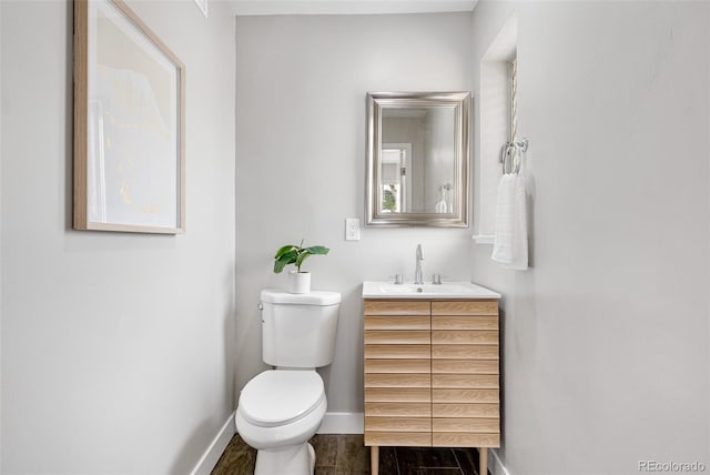 1295 Elm St, Denver, CO 80220 - bathroom featuring vanity and wood finished floors