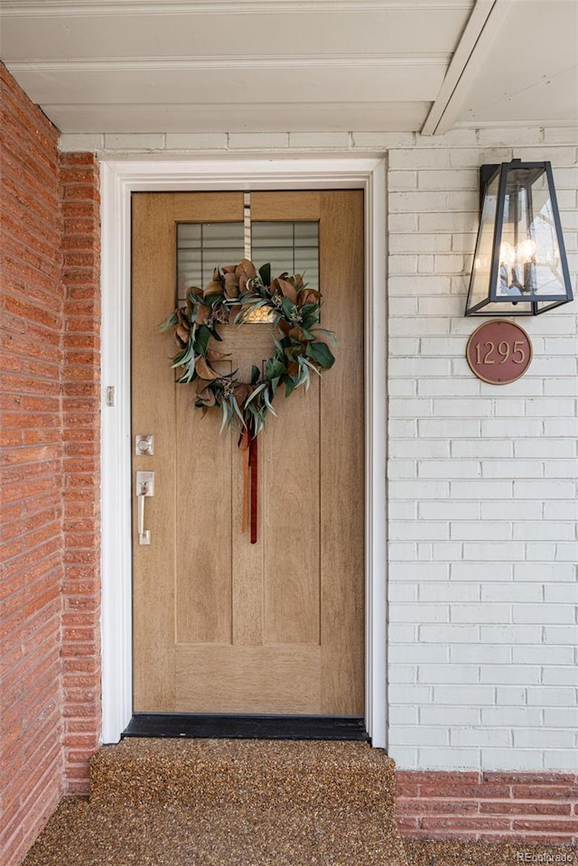 1295 Elm St, Denver, CO 80220 - entrance to property featuring brick siding