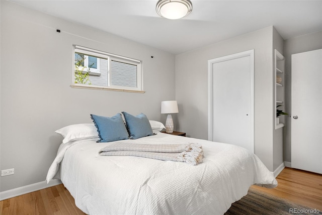 1295 Elm St, Denver, CO 80220 - bedroom featuring wood finished floors