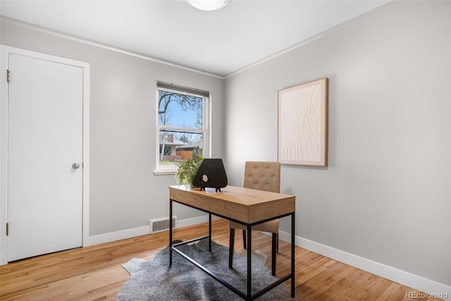 1295 Elm St, Denver, CO 80220 - home office featuring baseboards and wood finished floors