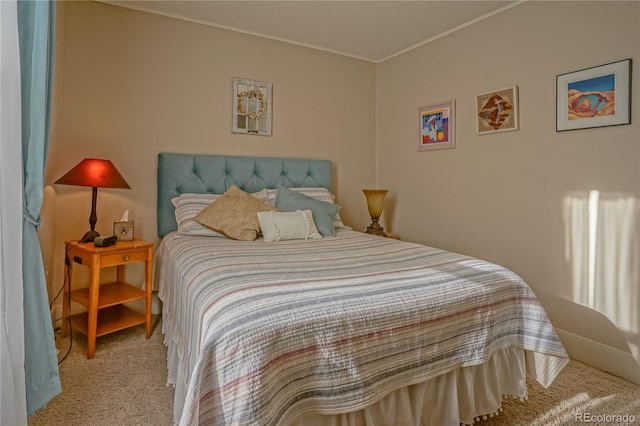 bedroom featuring light carpet